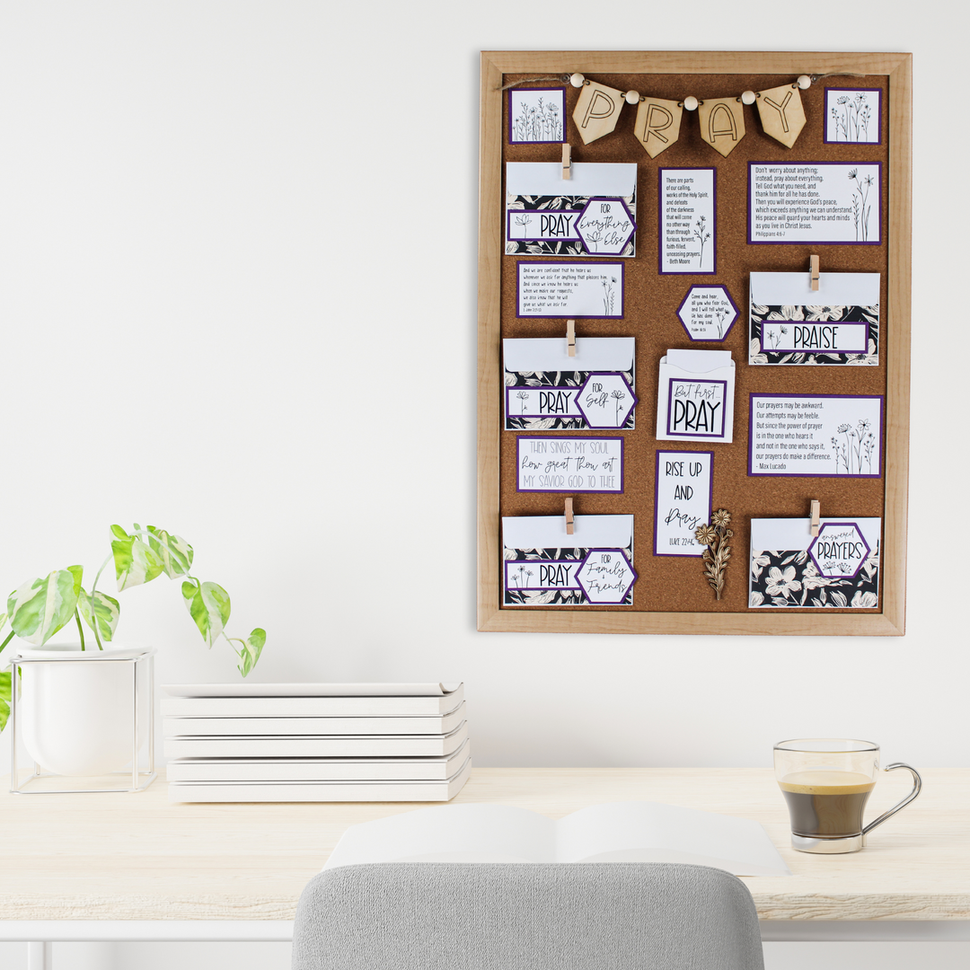 This prayer board features purple accents, wildflower graphics and dramatic black floral envelope covers.
