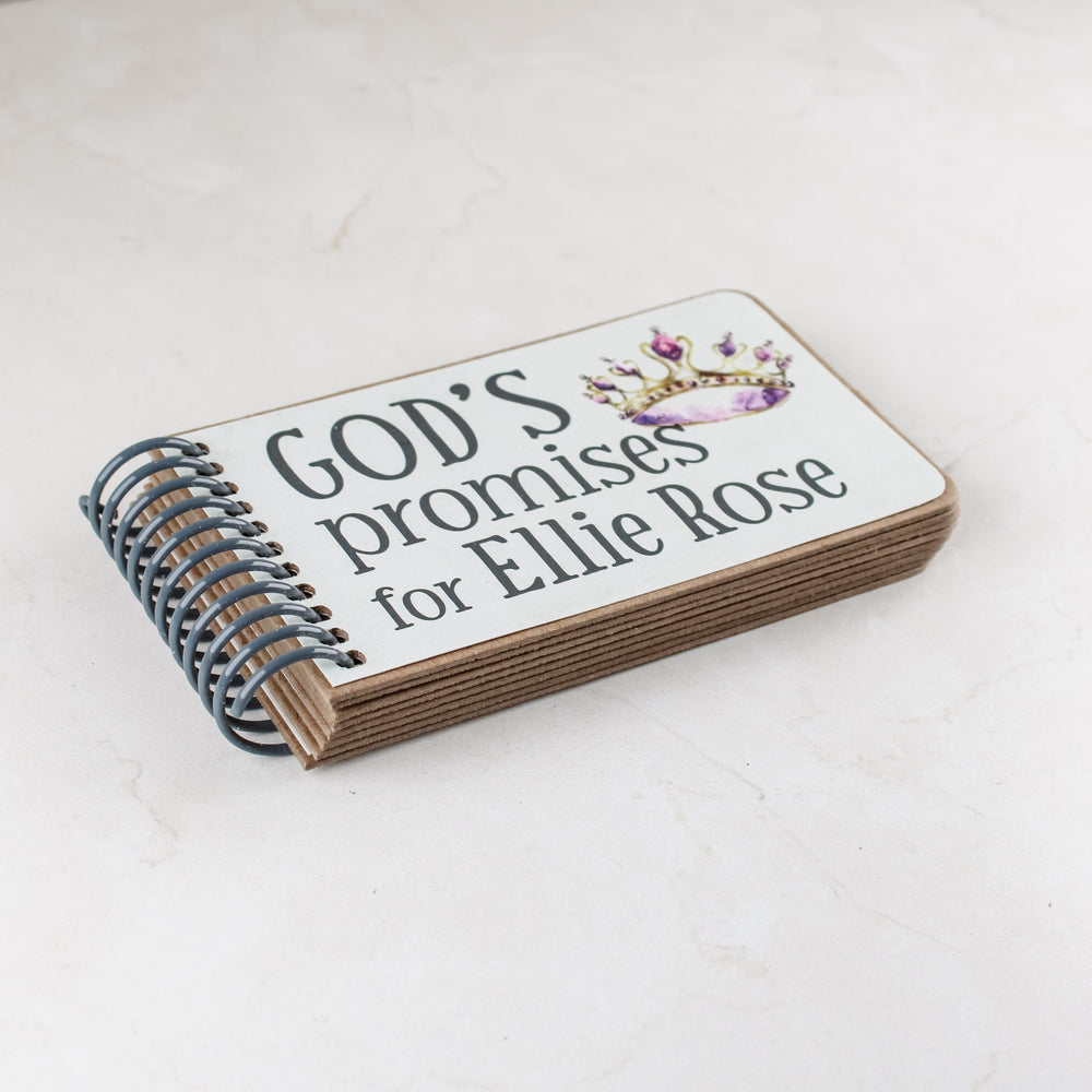 Personalized baby girl gift with princess graphics in purple hues, 7 promises of God with scripture for children inside.
