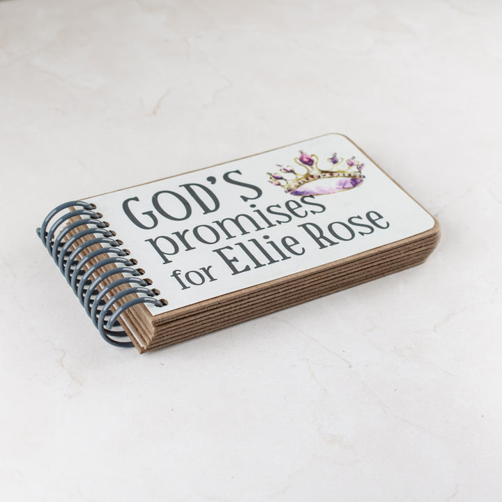 Personalized baby girl gift with princess graphics in purple hues, 7 promises of God with scripture for children inside.