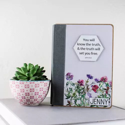 Get well gifts for females - personalized Bible verse book in wildflower style with purple wildflowers, John 8:32 and personalized nameplate on front cover.