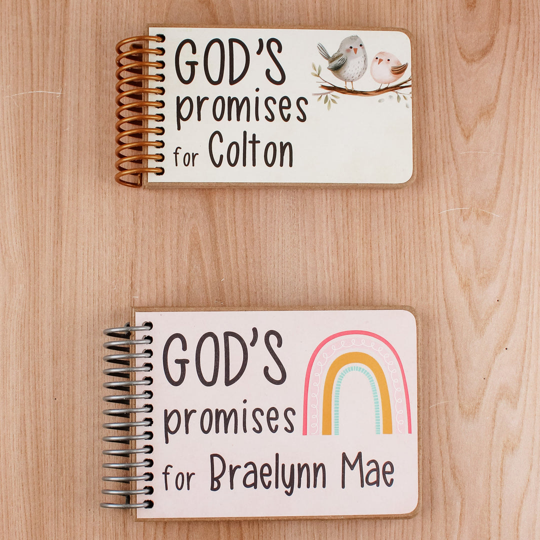 Two personalized God’s Promises spiral books for children, with bird and rainbow cover designs.