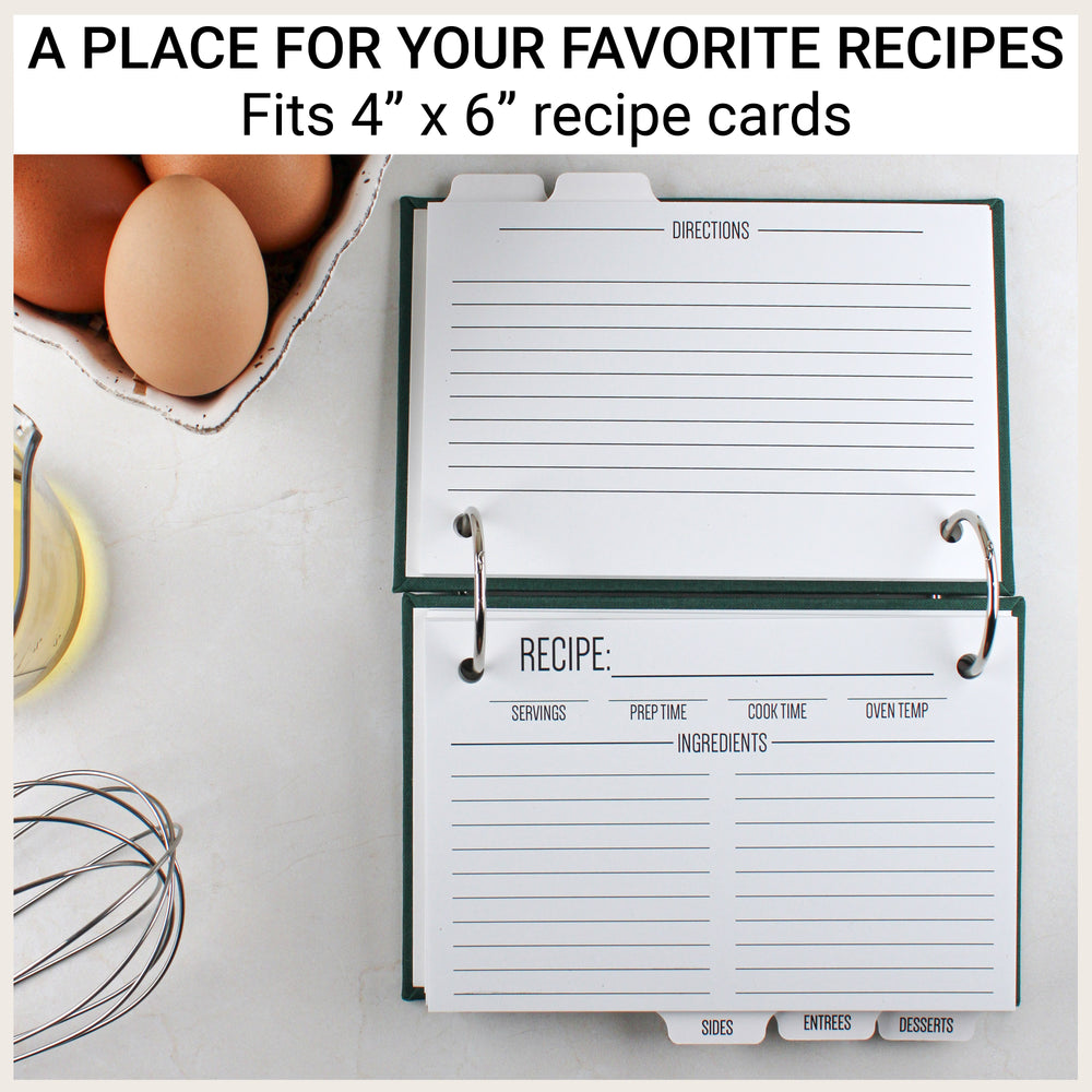Open recipe binder showing both sides of blank 4-by-6-inch recipe cards and recipe category dividers.