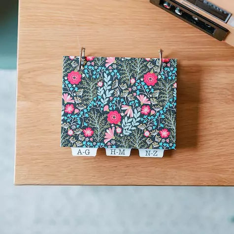 username and password book with blank cover in dark flowers pattern