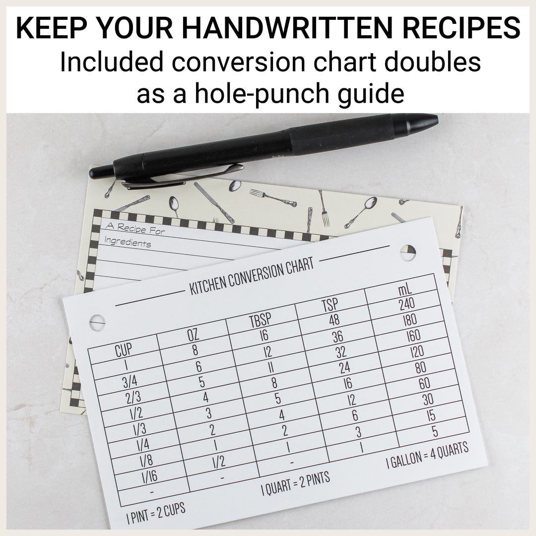 Included kitchen conversion chart placed over a handwritten recipe card to demonstrate its use as a hole-punch guide.