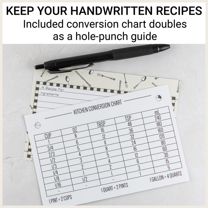 Included kitchen conversion chart placed over a handwritten recipe card to demonstrate its use as a hole-punch guide.