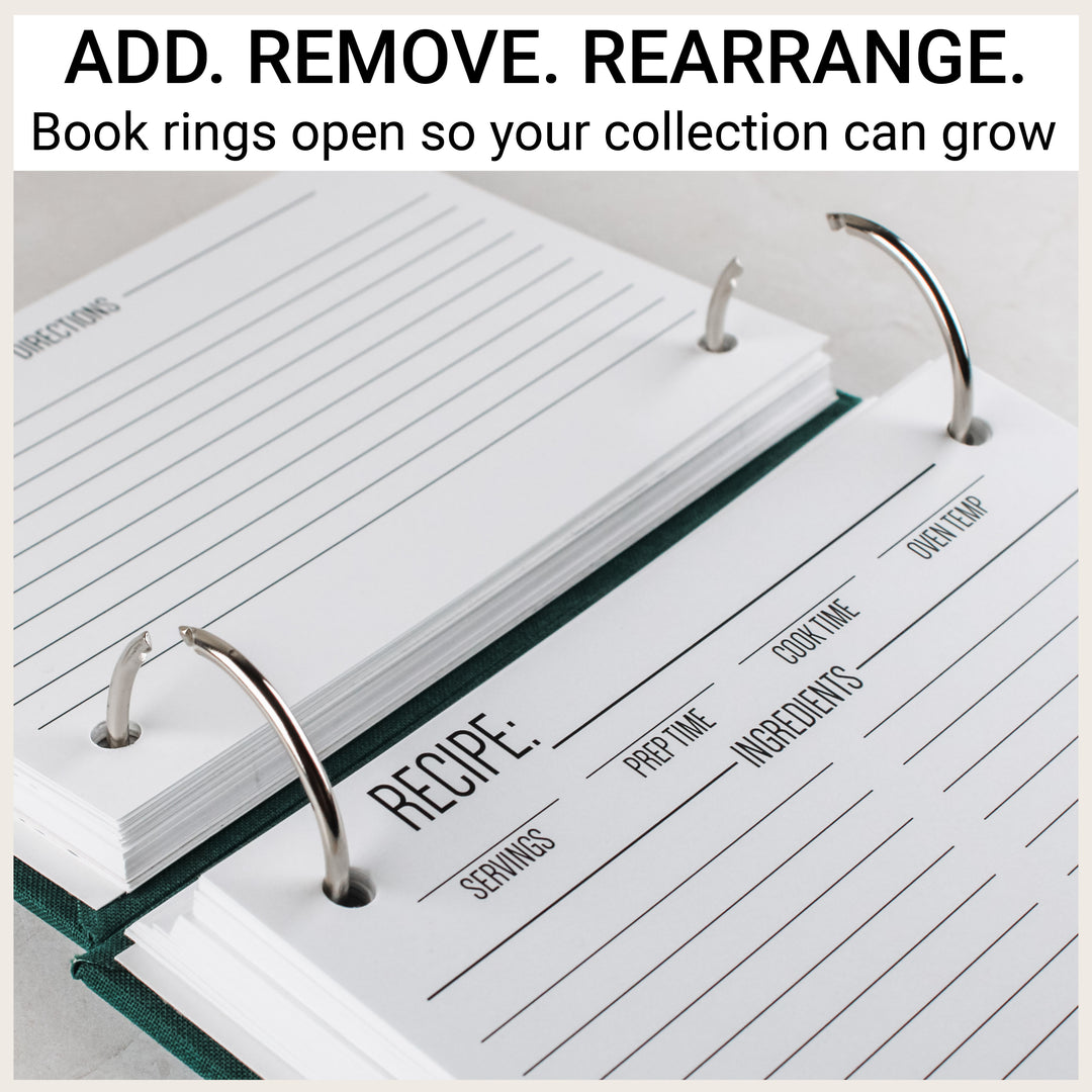 Open silver book rings in a green recipe binder, showing how recipe cards can be added, removed and rearranged.