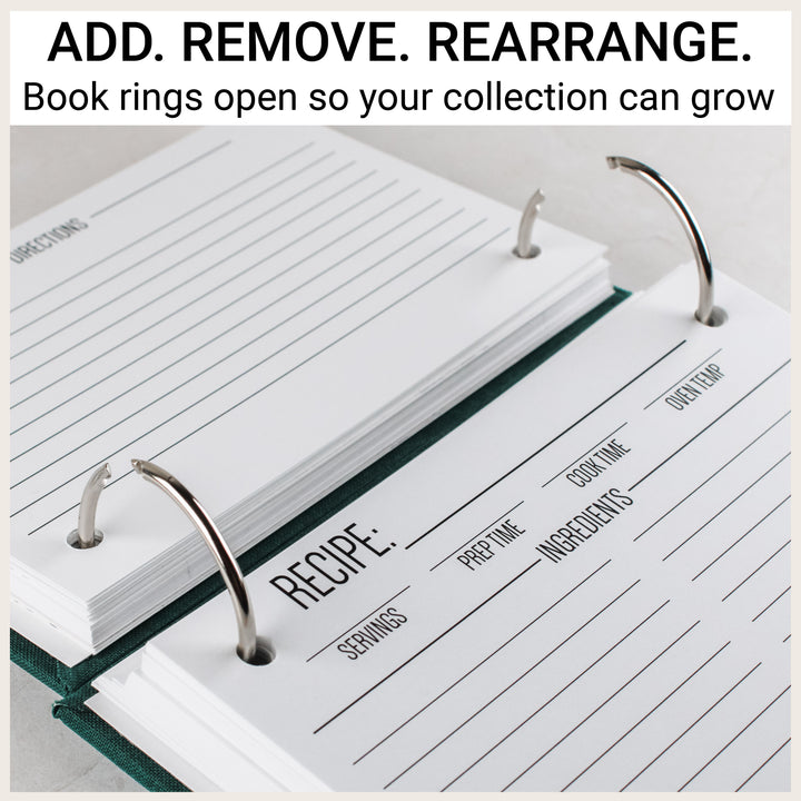 Open silver book rings in a green recipe binder, showing how recipe cards can be added, removed and rearranged.