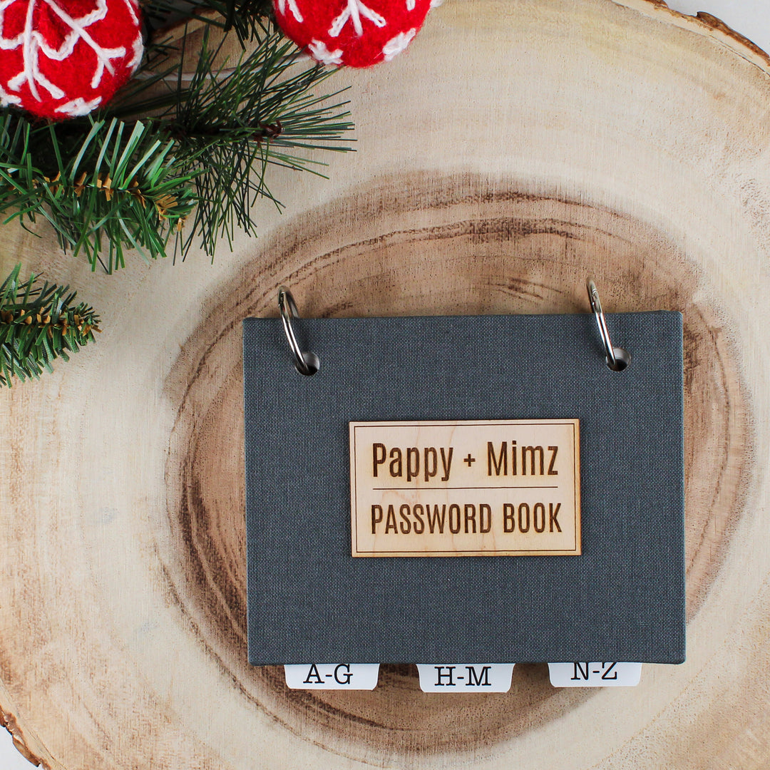 Premium personalized password book in gray bookcloth with wood veneer title that says Pappy + Mimz PASSWORD BOOK. 