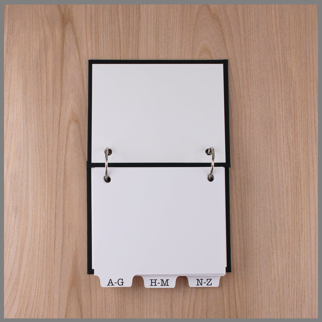 address book open to show tabs and high-quality handmade craftsmanship.