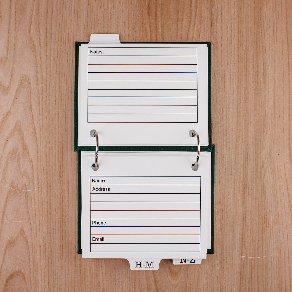 small address book open to see inside pages.