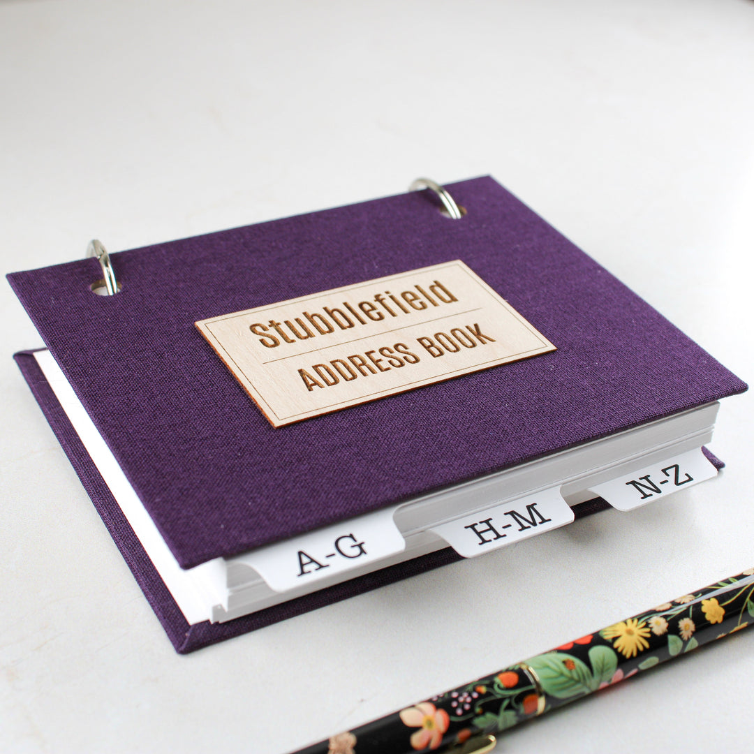 Address Book with Refillable Pages and Alpha Tabs