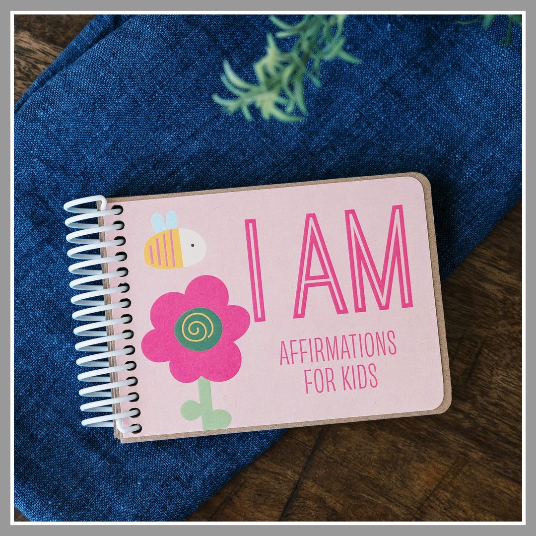 Pink, girly book of positive affirmations for kids with colorful girly graphics.