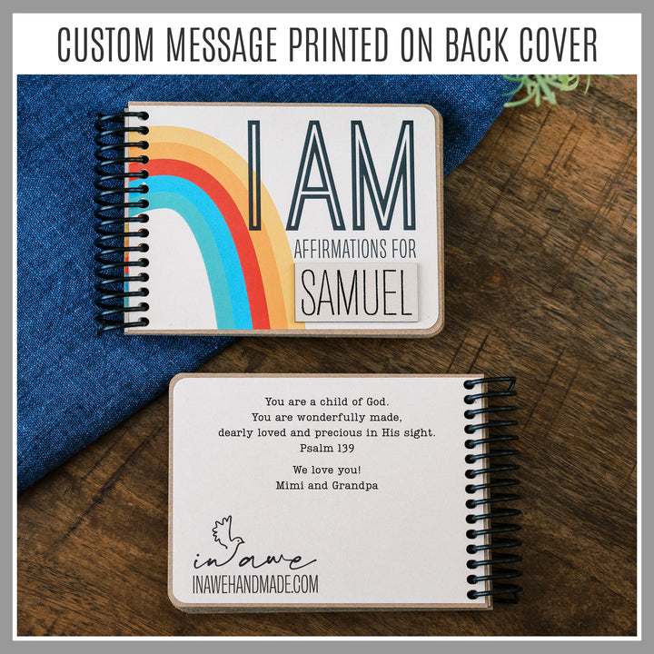 Personalized Rainbow affirmation book with laser-engraved nameplate and custom message printed on the back.