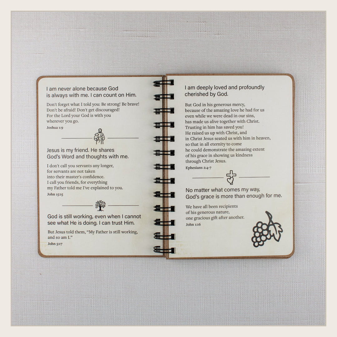 Open biblical affirmations book with Scripture about God’s presence, love, grace, friendship and faithfulness.