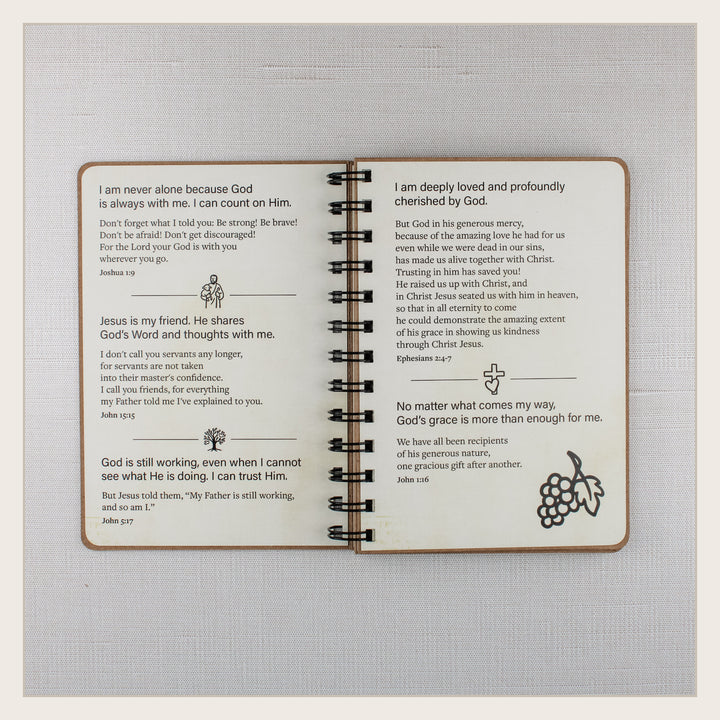 Open biblical affirmations book with Scripture about God’s presence, love, grace, friendship and faithfulness.
