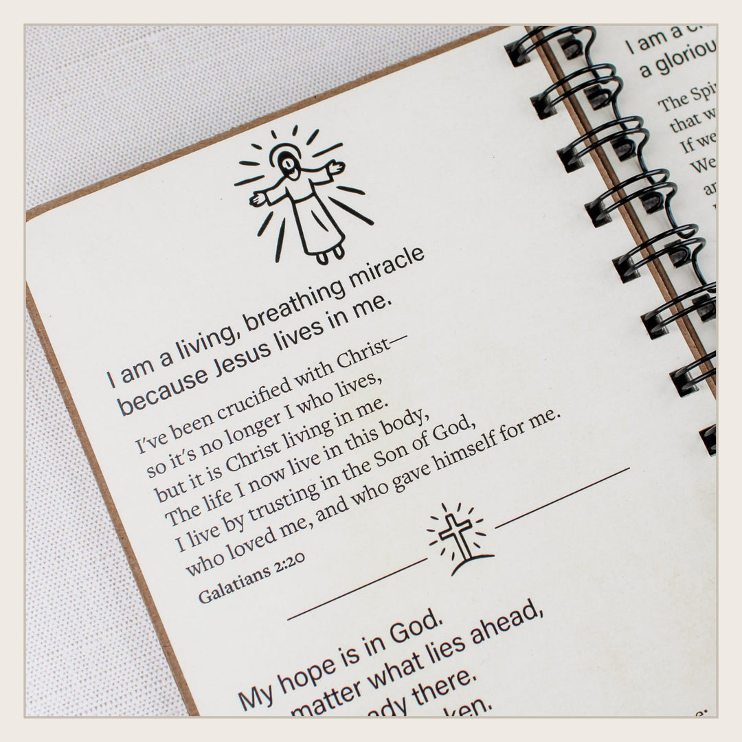 Close-up of a Christian affirmation and Galatians 2:20 about Christ living in the believer.