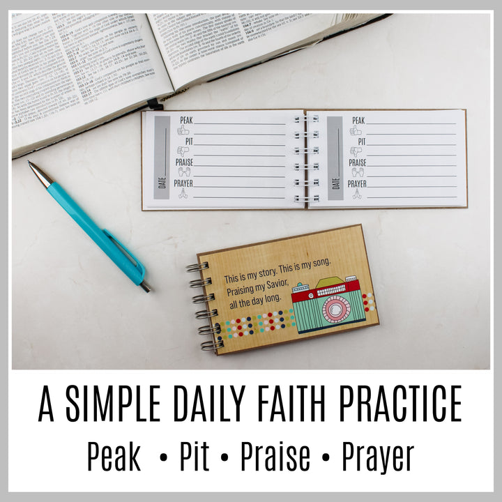 Open 4P Christian prayer journal beside a Bible showing Peak, Pit, Praise and Prayer prompts for daily reflection.