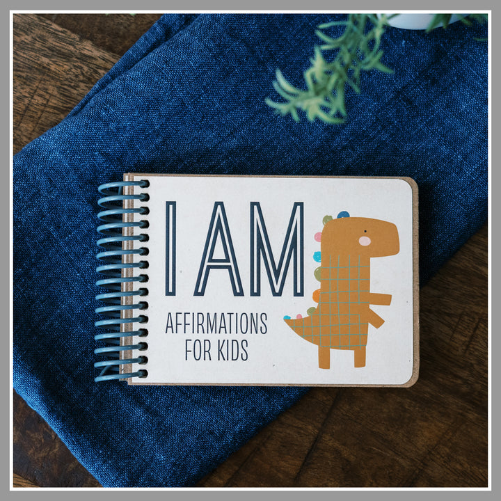 Dinosaur book of positive affirmations for kids with colorful dinosaur cover illustrations.