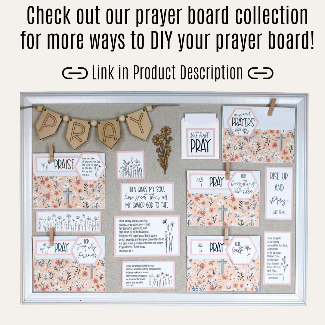 DIY prayer board decorated with a wooden PRAY banner, prayer envelopes, Bible verses and floral cards.