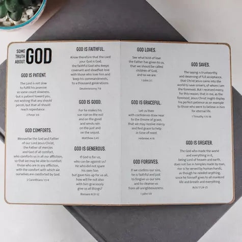 Book open to full spread with text and Bible verses about God.