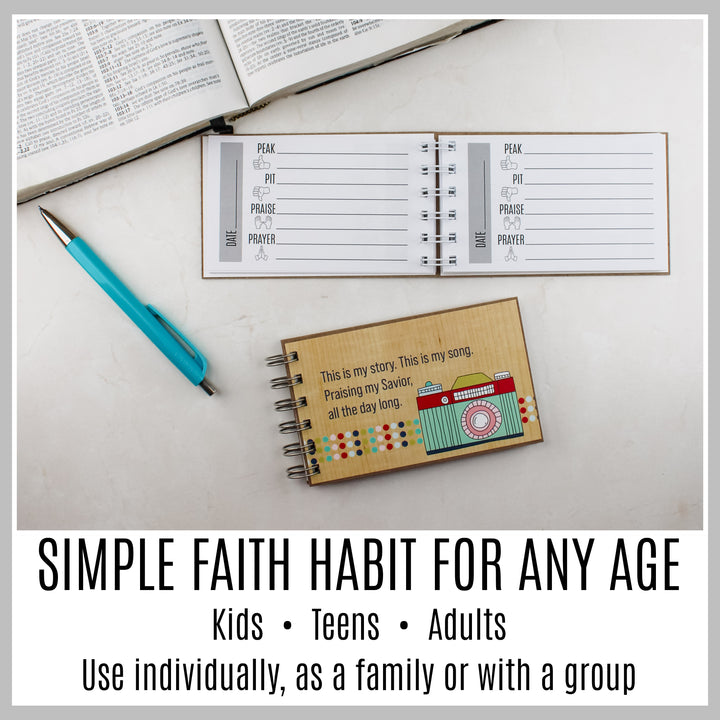 Camera-style guided Christian journal with Peak, Pit, Praise and Prayer pages for kids, teens and adults.