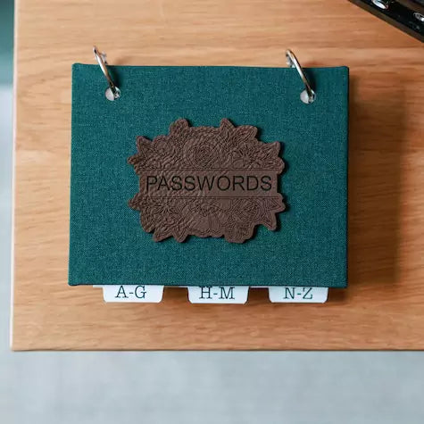internet password book in forest green book cloth with leatherette password on cover.