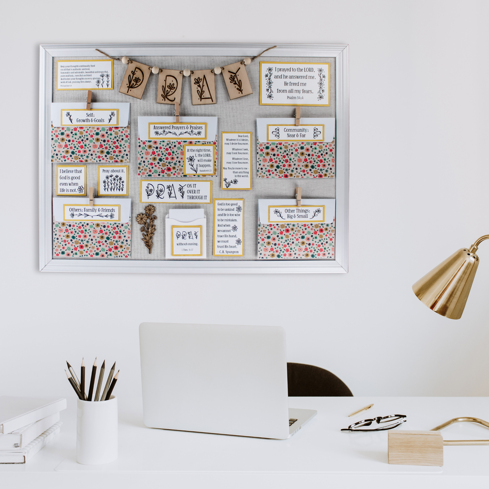 Daisy Prayer Board Kit with yellow accents shown in a home office.