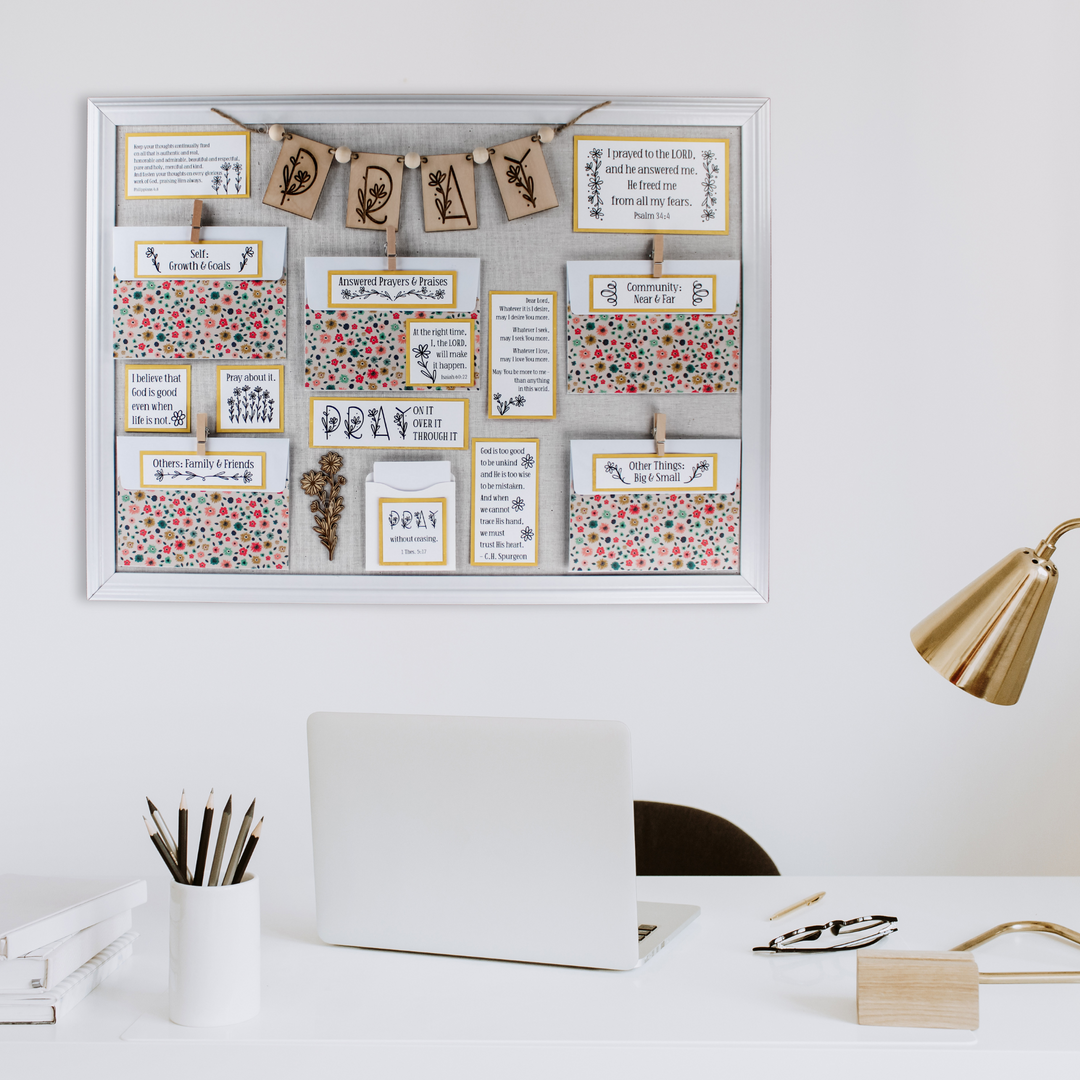 Daisy Prayer Board Kit with yellow accents shown in a home office.