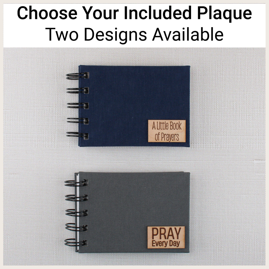Navy and gray spiral prayer books showing the two included wood plaques: A Little Book of Prayers and PRAY Every Day.