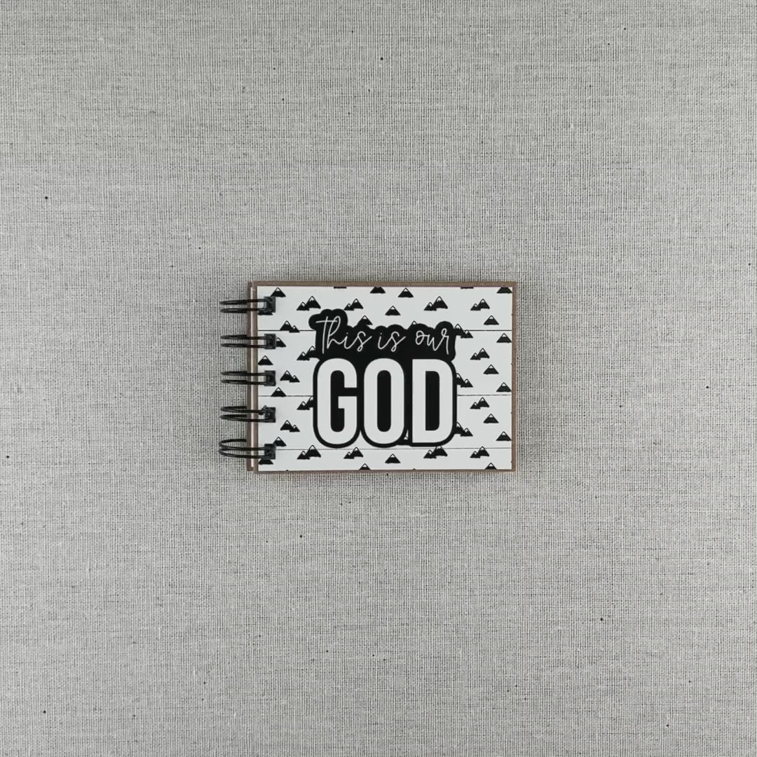 This is our God, God's attributes in a book,  Mountains style product video.