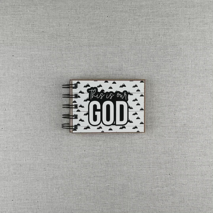 This is our God, God's attributes in a book,  Mountains style product video.