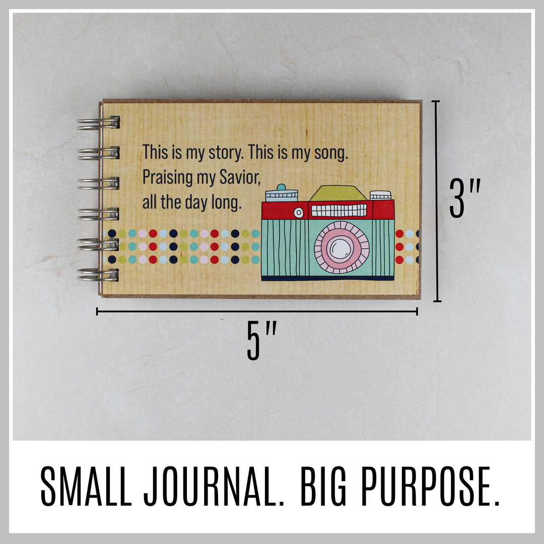 Camera Christian journal showing its compact 5 by 3 inch size.