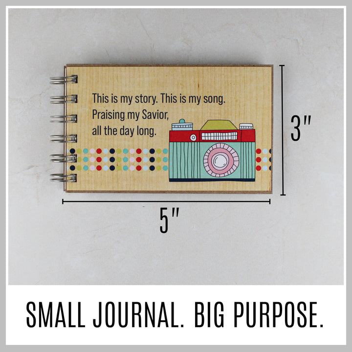 Camera Christian journal showing its compact 5 by 3 inch size.