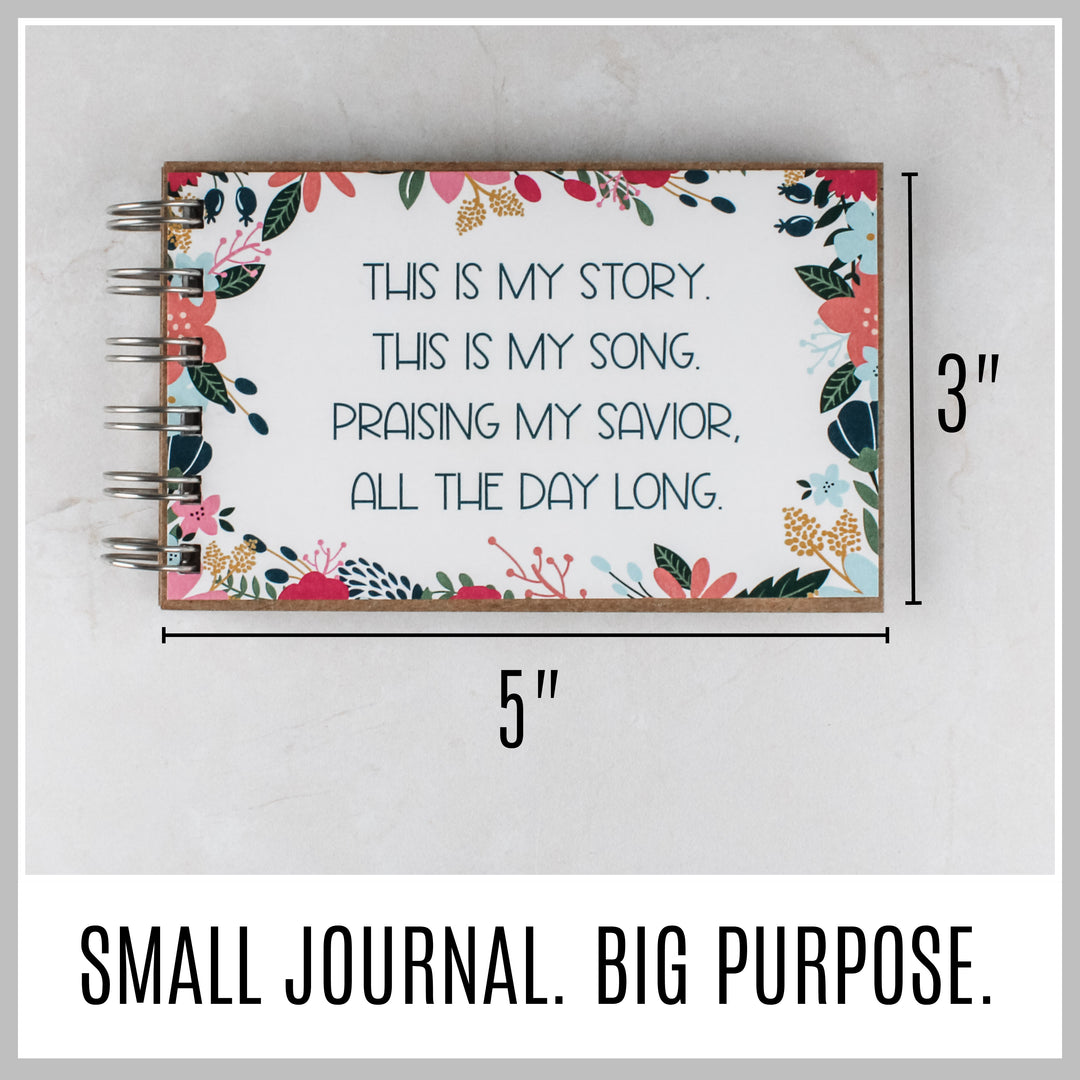 Flower frame Christian journal showing its compact 5 by 3 inch size.
