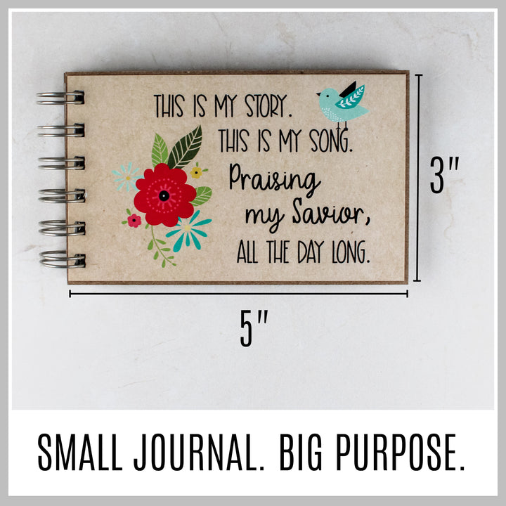Bluebird Christian journal showing its compact 5 by 3 inch size.
