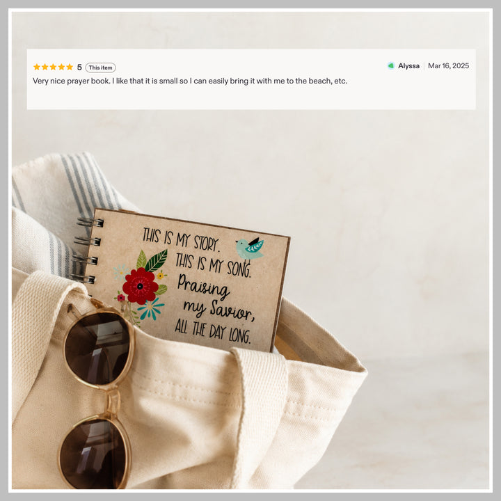 Small 4P Christian prayer journal tucked into a tote bag for reflection and prayer at home or on the go.