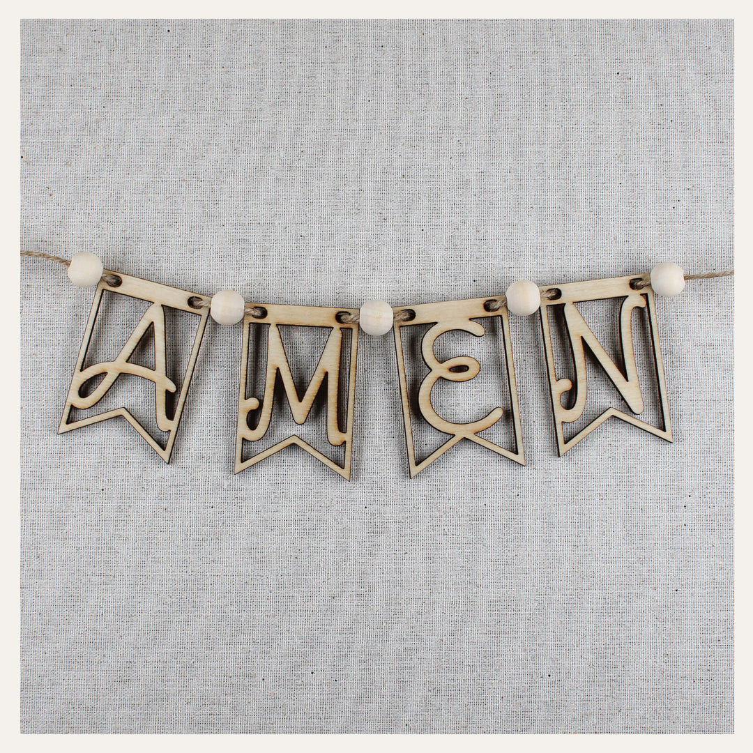 Assembled wooden AMEN banner with natural wood beads and jute string for prayer wall decor.